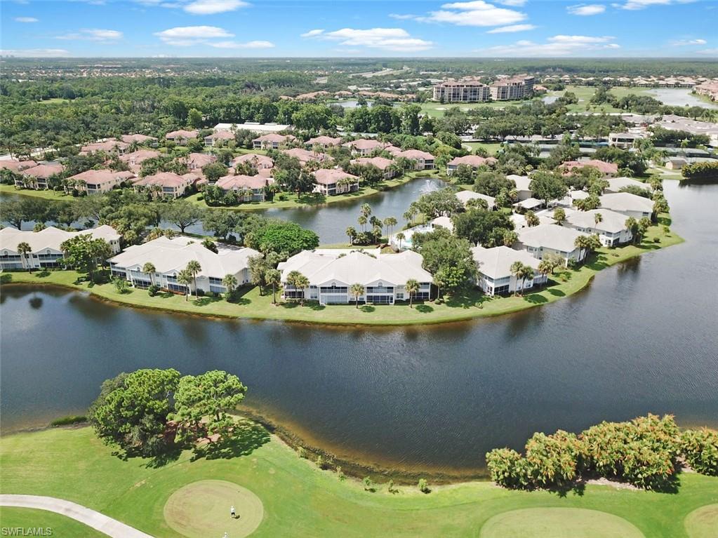 E-Z-2-C!!  You'll want to see this three bedroom, two bath spacious waterfront condo first! If you're looking for a serene water and golf course view in a tranquil location with covered parking you've found it! A top value in a beautiful and well maintained gated neighborhood in the Vineyards in North Naples - a resort style community with renowned private golf and tennis country club available when you purchase a separate membership.  Enjoy the heated pool across the street - perfect for your relaxation and entertainment. Move-in ready with furniture negotiable. Under six miles to Mercato, The Waterside Shops and Artis Naples for shopping, dining and entertainment and minutes to Vanderbilt Beach and the sugar sand beach of the Gulf of Mexico. Vineyards Community Park offers Softball, soccer, tennis, basketball, walking trail, picnic shelters, covered pavilions, playground and a water play feature. Ready for quick occupancy. Ask about amazing financing options! Don't wait - call now to schedule a private showing! 2014 Chevrolet Impala may be sold separately.