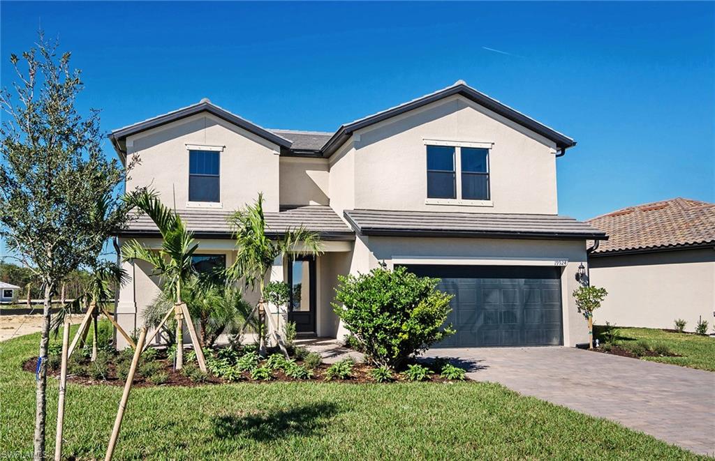 Citrus Grove floor plan is move in ready! Beautifully appointed interior finishes include 42" white kitchen cabinetry, colonial white granite countertops, stainless steel appliances, glass tile backsplash and 12" x 21" positano blanco porcelain tile. The Place at Corkscrew features resort style amenities including a restaurant, café and marketplace, 11,000 SF ft.  pool with 100-foot long water slide, fire pit areas, tennis and much more!