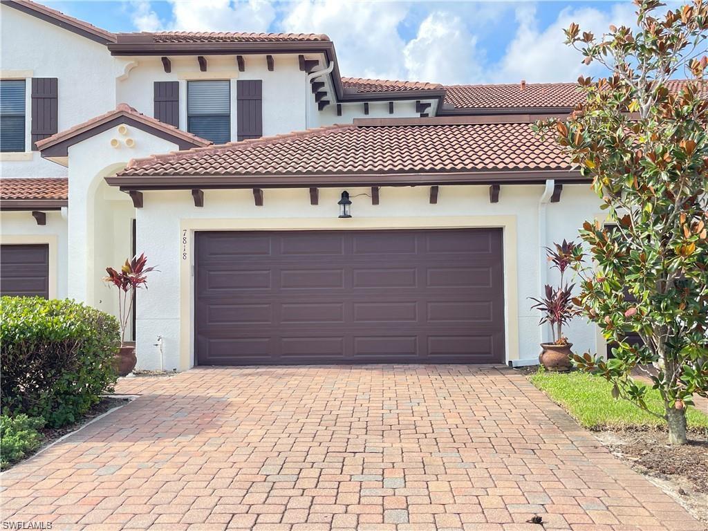 Well maintained townhouse with master bedroom in downstairs. Located in a great school zone. This 2,000+ sqft under air home features 4 bedroom, 3.5 bath and 2 car garage. Granite counter tops and stainless-steel appliances in the kitchen. Master bathroom has dual sinks and a separate tub and shower. Upstairs has a second master with attached bathroom and 2 bedrooms with a shared bath and a loft. All bedrooms have fans and window treatments. Enjoy your morning beverage outside your extended screened in lanai with a lake view. Gated community with Clubhouse, Community Pool, Fitness Room, basketball courts and play area. Close to everything: Founders Square, Gulf Beaches, Mercato, shopping, restaurants, etc. Don't miss this opportunity!!