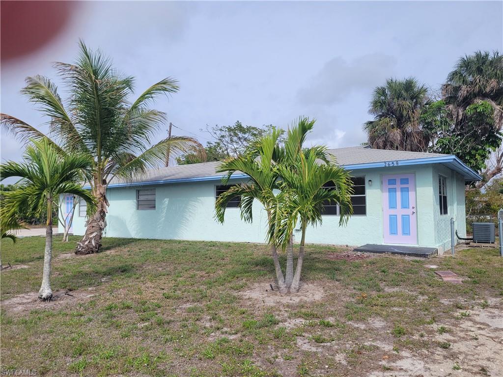 This adorable duplex comes with two units which have 2bed, 1 bath, kitchen and living room each and is situated on a very quiet street.  These two units have been updated and show very well.   Laundry room with washer & Dryer hook up that both units have access to.  Fenced throughout the backyard giving the units their privacy from one another as well.  There is also a House next to this, 2662 Mangrove that sits on a separate lot with Gulf Access that is for sale, MLS#226011418.  The Seller owns the whole street so if you bought both properties you would have your own road!