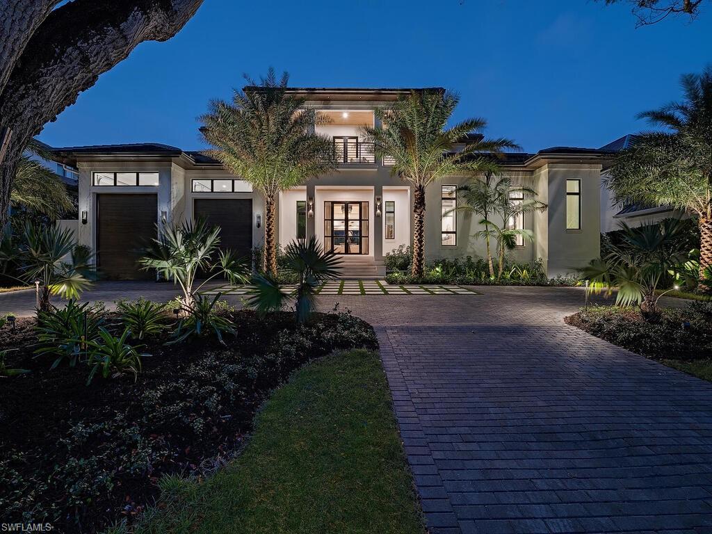 Situated on nearly half an acre, and mere steps away to the pristine Old Naples beaches and renowned 3rd St. South shopping and dining, lies a stunning example of Caribbean Contemporary design. Penned by Falcon Design Inc., constructed by Knauf-Koenig Group, and featuring interior selections and furnishings by Jeffrey Fisher Home, this collaboration has created a residence without compromise. Inside, the property features bespoke cabinetry by Marcus Jelley for Woodworkers of Naples and 6 bedrooms en suite, a full prep kitchen, and laundry areas on the first and second level. Outside, the sprawling outdoor area has multiple seating areas, a 50 foot lap lane pool, and a separate guest cabana, all to create a true resort-like experience.