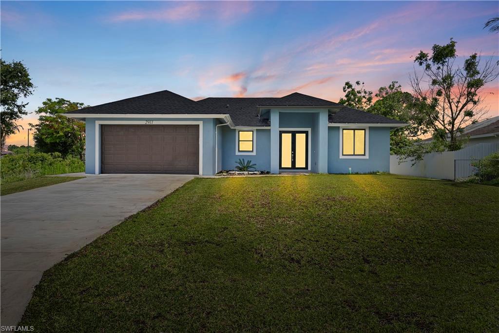 Location, location, location! Situated in the highly sought-after Sunshine neighborhood of Lehigh Acres, this beautiful 3-bedroom, 2-bathroom home offers the perfect combination of style, comfort, and convenience. With easy access to State Road 82, you'll enjoy a quick commute to Fort Myers, shopping, dining, schools, and everything Southwest Florida has to offer.

Inside, you'll find a bright open-concept layout designed for modern living. The spacious kitchen features a long center island perfect for entertaining, meal prep, and gathering with family and friends. Stylish modern finishes throughout the home create a clean, contemporary feel, while the gorgeous accent wall adds a custom designer touch that makes the living space stand out.

The split-bedroom floor plan provides privacy for the primary suite, while the additional bedrooms offer flexibility for guests, a home office, or growing families. Whether you're a first-time homebuyer, relocating, or looking for a move-in-ready home in a prime location, this property checks all the boxes.

Don't miss your opportunity to own a beautifully finished home in one of Lehigh Acres' most desirable and rapidly growing areas.