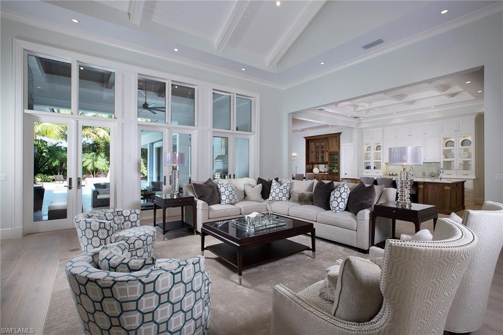 Situated on a quiet, non-through street in the Moorings, this
sprawling one-level single family home offers five bedroom, five
and two-half bath home is sure to impress with approximately
4,516 sq. ft. under air and a beautifully serene outdoor area
including an outdoor kitchen, heated pool and spa. This
expansive plan affords plentiful areas to entertain while still
offering a large, private master suite, two additional guest
bedrooms, VIP guest suite and gracious study. A three-car
garage, gourmet kitchen and designer finishes throughout the
property are among the many upgrades. This property also
offers residents eligibility for membership to the private Moorings
Beach Park.