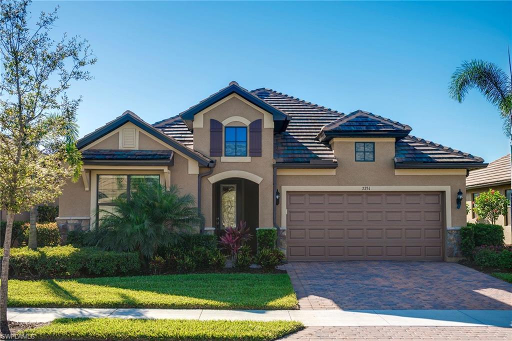 Beautiful Abbeyville model with open layout that's available NOW! Premium lot with wide lake and preserve views. This home boasts more than $100k in upgrades! TRUE VALUE  that includes desirable impact resistant windows and doors, smooth finish drywall, custom front door, laundry room with utility sink and storage, center island, pantry, granite counters, tile back splash, outdoor vented range hood and natural gas appliances. Frameless shower door and double sinks in master bath with walk-in closet. Ceiling fans indoors and out. Entertain on the spacious, screened lanai with coveted outdoor kitchen with natural gas grill, fridge, sink with H/C water and TV. Take a dip in the heated, salt water pool or relax in the spa. Winding Cypress is appreciated for its active, social lifestyle and world class amenities nestled within 800 acres of natural preserve areas. Stroll over to the state-of-the-art clubhouse, resort-style pool and restaurant. Bike to the preserve boardwalk and if gardening is your passion, there are community gardens. Minutes from treasured sugar sand beaches, fishing, kayaking and amenities including downtown Naples with shopping, dining and cultural attractions.