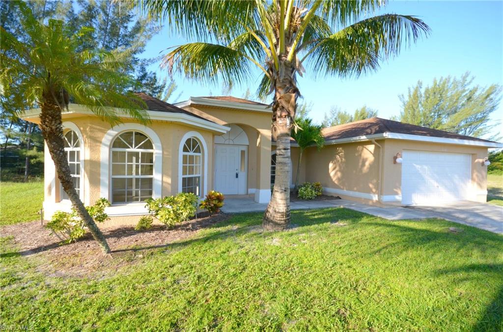 Beautiful 4/2 canal home in Cape Coral. This spacious home offers more than 1700sq ft of living space, large, open living area, kitchen with breakfast bar and separate dining room, and indoor laundry room. The house is all tile, except for the stunning hardwood floors in the master bedroom. Lots of windows offer tons of light and views of the canal. The backyard is ready for a pool or to keep as is and enjoy the serenity of the palms overlooking the water. Take a private tour today, this is priced to sell FAST!