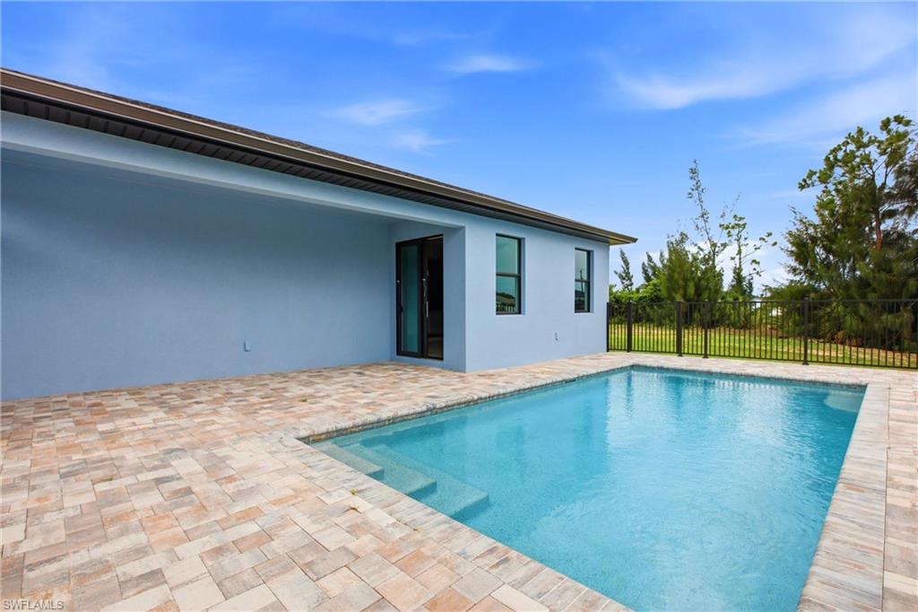 Brand New Canal-Front Pool Home for Rent, 3/2/2, NE Cape Coral. The Builder Didn't Cut Corners, So You Don't Have To Settle

Imagine renting a home where someone else handles the pool, your backyard overlooks a peaceful canal, and every room is completely brand new. Welcome to this 3-bedroom, 2-bath home in NE Cape Coral, where convenience comes built in.

The biggest perk? Professional pool care is included, saving you roughly $125 every month while giving you all the benefits of having your own private pool without spending your weekends cleaning it.

Step through the front door and into a bright, open layout with 1,515 square feet of thoughtfully designed living space. The living area flows naturally into a kitchen that was made for real life, featuring waterfall countertops, premium cabinetry, recessed lighting, oversized ceiling fans, and a large peninsula that works just as well for quick breakfasts as it does for entertaining friends.

The split-bedroom floor plan provides privacy for the primary suite while keeping two additional bedrooms nearby for family, guests, or a home office. Both bathrooms feature modern finishes and lighted anti-fog mirrors that make busy mornings a little easier.

Outside is where Florida living takes over. Cool off in your private pool, relax on the paver deck, or enjoy the peaceful canal view from your fully fenced backyard. Whether you're hosting a weekend barbecue or simply unwinding after work, this outdoor space was designed to be used.

You'll also appreciate the practical features that make everyday living easier, including a spacious two-car garage with an epoxy-coated floor and washer and dryer hookups ready for your own appliances.

Another bonus: there is no city water bill. The home is served by a private well, and professional well maintenance is already arranged for you, including routine service and salt replenishment. A flat $65 monthly well service fee is billed with rent, so you never have to coordinate maintenance yourself.

Conveniently located near shopping, restaurants, parks, schools, and everything Cape Coral has to offer, this home combines the benefits of new construction with the lifestyle people move to Southwest Florida to enjoy.

Pets are welcome with approval. A one-time pet fee applies, with a minimum fee of $350 per pet, plus a $25 pet acceptance fee per pet. There is no monthly pet rent. Breed restrictions apply.

Lease Terms: Available now. 12-month lease. Security deposit of $2,799 and application fee of $75 per adult apply. $45/month Resident Benefit Package fee. $65/month well service fee. Pool care is included. Tenant provides washer and dryer.