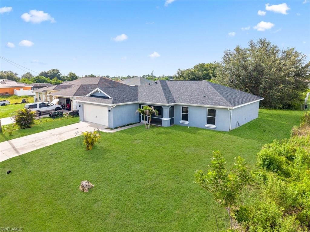 Fully remodeled 3 bedroom with den in the heart of Lehigh Acres! Next to Gunnery and SR82. Totally remodeled inside with a brand new roof. Perfect for first time home buyers. Tile floors in the bathrooms and file tile to the ceiling in the showers. Spacious open floor plans. 2 car garage. Very safe neighborhood surrounded by nice homes. Closing cost assistance negotiable. Call today for showings. Hablo Español!