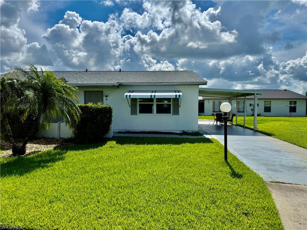 2 bedroom 2 bath Pinewood Villa located on a quiet low traffic Cul De Sac, plenty of privacy in the yard and plenty of extra parking for up to three cars, open 12 X 11 patio, NEW WATER HEATER IN 2025, NEW CENTRAL HEAT AND AIR IN 2017, NEW INSULATED WINDOWS IN 2026 with new shades, NEW LUXURY VINYL PLANK FLOORS THROUGHOUT IN 2025, NEWLY REMODLED KITCHEN AND BATHROOMS WITH NEW SOFT CLOSE DOORS AND DRAWERS, NEW COUNTERTOPS, STAINLESS STEEL APPLIANCES, NEW VANITIES AND TOILETS IN THE BATHROOM WITH TILED WALLS IN THE BATH AND SHOWER AREA WITH NEW SHOWER FIXTURES, FRESHLY PAINTED INTERIOR, stucco exterior, indoor laundry area with full size washer/dryer, walk in closet,  55+ community, walking distance to stores etc., pets OK, Located just off of Homestead Rd just minutes to I-75, Ft Myers and SWFL International Airport. NO flood insurance required here. Lehigh is the highest elevation in Lee County.