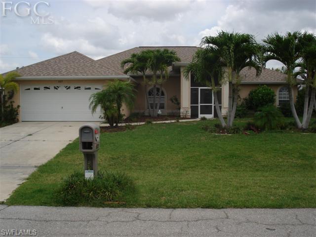 This is a Short Sale subject to existing lender's approval which could result in delays. Current owner purchsed property from Baywood Construction in 2005. Three bedrooms, plus den or 4th bedroom, 2 & half baths, foyer, formal living, dining & family rooms help provide 2,473 ft. of living area under air. Large kitchen with corian surfaces & pantry. Separate laundry room & tub. Tile everywhere, except for bedrooms & 4th bedroom or den, which are wood-like. Master has 2 walkins, separate shower & garden tub & dual vanities. Blinds on all windows. Backyard is fenced. Screened lanai covers pool & covered porch. Pool storage. City water/sewer & auto sprinkler system. Located in sought after area of the cape. Screened double door entrance. If this property matches your criteria, take a moment to check it out.