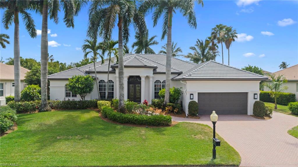 Welcome to 14540 Ocean Bluff Drive, an exceptional custom estate nestled within the prestigious Edgewater enclave of Gulf Harbour Yacht & Country Club. Situated on a beautifully landscaped homesite, this elegant residence perfectly blends privacy, sophistication, and the ultimate Southwest Florida lifestyle. Designed for comfortable everyday living and effortless entertaining, the spacious floor plan features over 3,300 square feet of refined living space characterized by soaring tray ceilings, exquisite crown molding, and an abundance of natural light. 3 spacious bedrooms, all featuring private en-suite baths, plus an additional half bath. A beautifully appointed private office complete with custom built-in cabinetry and elegant French doors. A grand glass double-door entry welcomes you into generous gathering areas. The spacious eat-in kitchen flows seamlessly into the expansive family room. A 2-car garage plus an attached dedicated golf cart garage. Offered fully furnished and move-in ready with upscale details like plantation shutters throughout. Three walls of sliding glass doors invite seamless indoor-outdoor living, opening up to an exceptionally private oversized screened lanai retreat. This resort inspired setting features a custom pool and spa surrounded by lush landscaping creating your own tranquil oasis. The luxurious primary suite serves as a private sanctuary, offering direct French door access to the lanai, a massive walk-in closet, and a spa-like bath with dual vanities, a soaking tub, and a separate walk-in shower. Enjoy ultimate peace of mind with significant recent improvements, including New Roof and Gutters, Freshly painted exterior and Fully re-screened lanai. Located behind the gates of one of Fort Myers premier luxury communities, residents can access world-class amenities through various membership options. Enjoy championship golf, tennis, state-of-the-art fitness facilities, wellness spa, dining, vibrant social events, and a full-service marina providing direct Gulf access. Superbly located, this home is just minutes from the beaches of Sanibel Island and Fort Myers Beach, as well as world-class healthcare, premier shopping, dining, and the Southwest Florida International Airport. Whether you are seeking a full-time residence, a seasonal retreat, or a luxury lifestyle investment, 14540 Ocean Bluff Drive represents a rare opportunity to experience the very best of secure, resort-style living in Gulf Harbour.