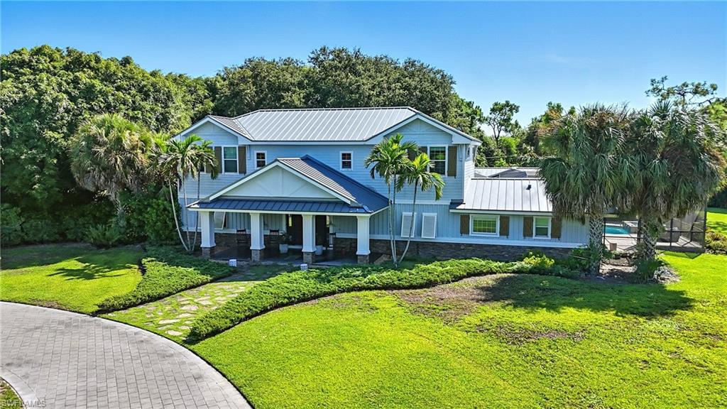 Exceptional equestrian estate in prestigious Pine Ridge. Situated on 2.16 acres of manicured grounds, this residence offers 4 bedrooms + den, 5.5 baths, and nearly 4,500 sq. ft. of light-filled interiors with soaring ceilings and seamless flow. A rare advantage in Naples, the property includes horse stables right on site, allowing equestrian enthusiasts to fully embrace the Pine Ridge lifestyle.
The gourmet kitchen features a professional-grade gas cooktop, double ovens, farmhouse sink, and oversized island. A handsome library offers a refined retreat for work or reading, while the spacious game room provides the perfect setting for fun and gatherings with family and friends.
Outdoor living is complete with a resort-style pool and spa, covered lanai, multiple lounge areas, and landscaped gardens.
Most properties in Pine Ridge sit on approximately one acre. This estate is a rare find, offering a double-size lot with 2.16 acres and a residence boasting 6,604 sq. ft. of total area—making it an exceptional value in today’s market.
Renowned as one of Naples’ most exclusive neighborhoods, Pine Ridge is celebrated for privacy, oversized homesites, and an unmatched location—just minutes from Mercato, Waterside Shops, The Ritz-Carlton, and Naples’ world-class beaches.
This estate is more than a home—it is a statement of luxury, legacy, and the very best of Naples living.