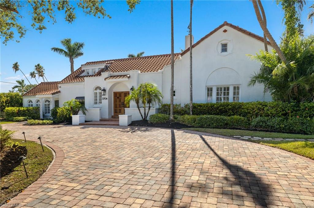 Experience the ultimate blend of historic elegance and modern luxury in this stunning Spanish charmer. Nestled in the highly sought-after neighborhood of Riverside McGregor, this property boasts original hardwood floors, arched doors, and a wood-burning fireplace, all while tastefully modernized enhancing its original charm. With two separate staircases leading to cozy living quarters, this nearly 4,300 square foot home is designed to cater to every need of the discerning buyer. Step outside to your own private oasis, complete with a wood-burning oven, expansive lanai, separate suite and sparkling pool. 
The setting is serene and private with two functional gates at the paved circular driveway. Extensive updating and maintenance including newer roof, newer appliances, updated pluming, complete paint job inside and out, updated lighting throughout the entire house, landscaping, new pool pump. 
With too much charm and detail to mention, this is an opportunity to own a piece of history that has been updated with the finest finishes. The home exudes old-world charm while tastefully incorporating modern elements. Don't miss out on the chance to call this exquisite property, home.
