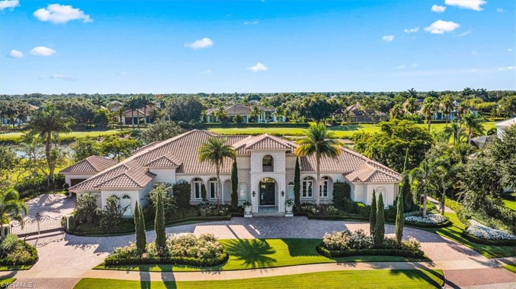 H6131- Welcome to this refined estate on a private cul-de-sac where gracious living meets easy Florida lifestyle. Both elegant and stylish, this Sand Dollar award winning home welcomes with polished marble floors and walls of windows leading to fantastic water and golf course views and an eastern exposure for sunny mornings and comfortable evenings. With a state-of-the-art media room, wine room with Wolf/Sub Zero wine refrigerators, two master suites and an enormous study with built-ins and gorgeous architectural detailing throughout, this home offers the space, functionality and style for which you've been searching, There is much more including a generous formal dining room and adjacent butler pantry, stunning chandeliers, spacious, Wolf-equipped gourmet kitchen, 4-car garage, plus all en-suite bedrooms to complete the list. Live al fresco on the spacious covered lanai with retractable screens, fireplace, outdoor kitchen w Wolf grill & bar area, custom infinity-edge pool
and spa plus plenty of gathering areas to meet every entertaining need. NEW ROOF and GUTTERS COMING SEPTEMBER 2022 to complete the upgrades. Award winning Quail West features gorgeous clubhouse & countless amenities.