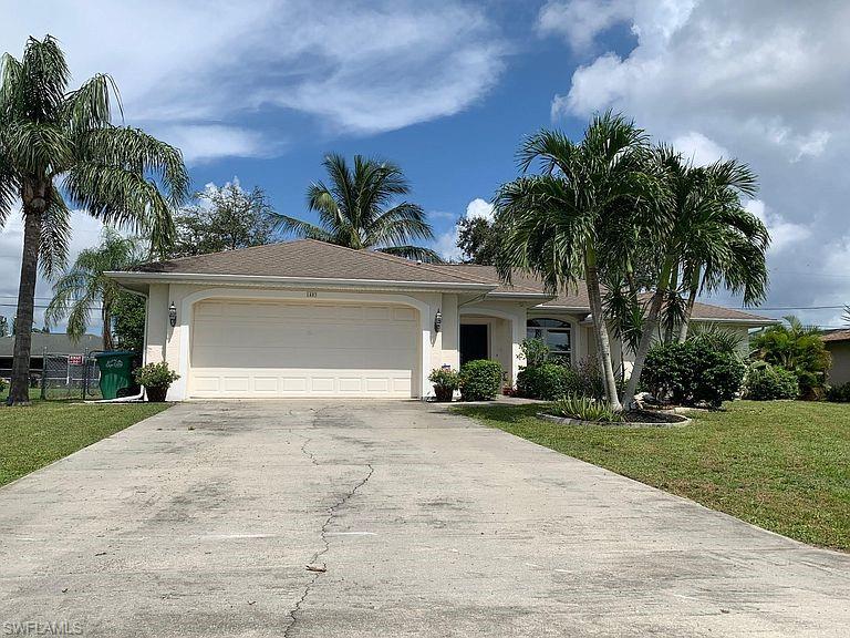 Nicely updated spacious home located in a desirable area of SE Cape Coral. Built in 2002. This home features a large kitchen with pantry, AC installed in 2014, fenced back yard, vaulted ceiling, walk-in closets for all bedrooms, mature landscaping, and much more.