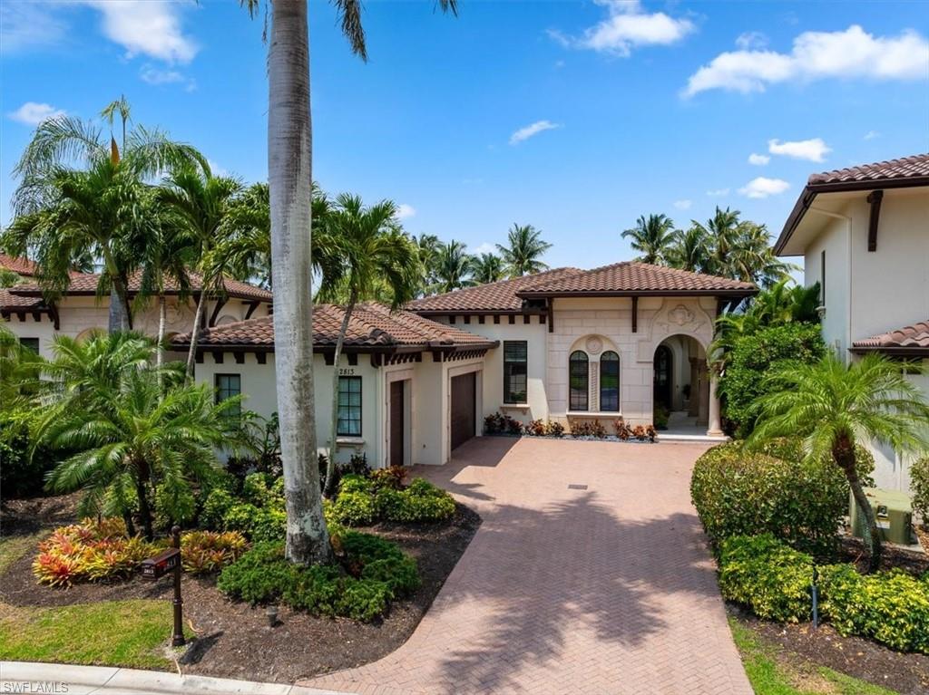 Stunning views of the lake and golf course is the back drop for this fabulous outdoor oasis with, brand new pool and hot tub, new pool deck and pool cage, new outdoor kitchen, pool powder room, electric storm shutters and large covered entertainment area for a tranquil sunset cocktail.  This home was meticulously executed by the original owners who have flawlessly maintained it; total pool renovation 2023, new outdoor grill, cage and custom electric shutters 2023, new front exterior entry flooring 2023, golf cart garage and all new garage doors 2022, customer garage cabinets and epoxy floor, new GENERAC generator 2022, new primary bath and custom closets 2022, new 500-gallon propane tank 2022, new roof 2019, new DYCON AC 2 zones 2015 and much more. The living spaces are open with high ceilings and great natural light; gracious primary suite with seating area and new stunning master bath along with new custom closet, 2 large guest rooms en-suite, a formal powder room and a pool powder room, wonderful multiple entertaining and living areas. Don’t miss this incredible value and opportunity.