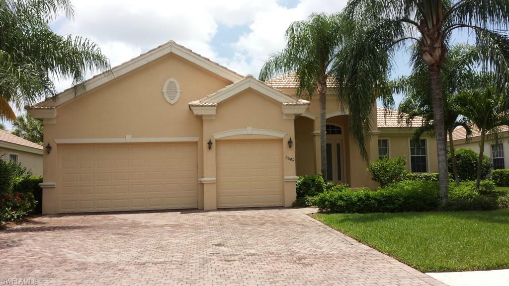 This home is an absolute delight.  It's ready for you to move into today.  It has over 2434 sq. ft. of living space.   Opening the front door you enter into a open foyer overlooking the Dining Room and Great Room.  The kitchen is open to the Great Room with a beautiful view of the lanai that overlooking a large lake. It has 4 spacious bedrooms and three full baths.  There is a three car garage.  This home has it all.  A must see!!!