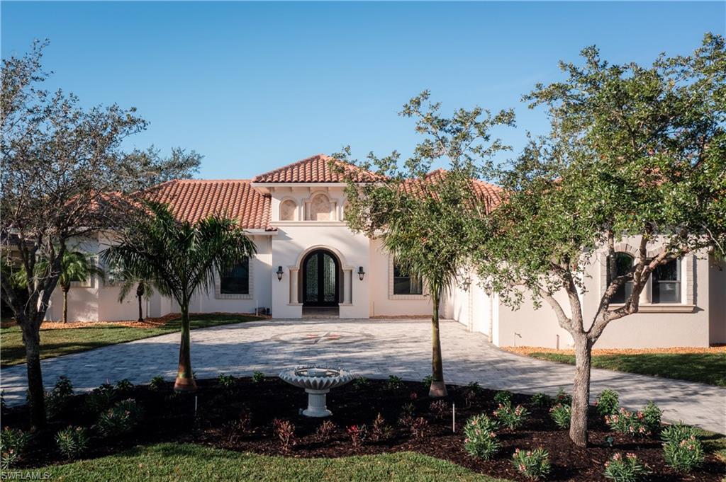Architecturally stunning custom 5BR+Den/5+BA/3-car estate by Robert D’Angeleo, set on a tranquil lot with serene natural surroundings and breathtaking western sunset views. This exceptional residence has just undergone significant updates including new landscaping and fountain, new flooring, cabinetry, pool deck, driveways, spray foam insulation, and fresh interior and exterior paint, enhancing both style and functionality. The one-of-a-kind enclosed lanai provides year-round living space with gas fireplace, summer kitchen, and glass walls that open to a screened lanai. The chef’s kitchen features an expansive island, high-end appliances, and walk-in pantry with dual counters. Exquisite custom millwork, dramatic ceilings, travertine tile, and plank wood flooring elevate every space. Five bedrooms plus private study; four guest suites with ensuite baths and walk-in closets. Luxurious primary suite is a private wing with spa bath and custom closets. Resort-style pool and spa with outdoor TV and surround sound complete this entertainer’s dream. Located in prestigious West Bay Club with private full-service beach club, dining, fitness, tennis, pickleball, river park exercise trails, kayaking, boat launch/storage and optional golf.