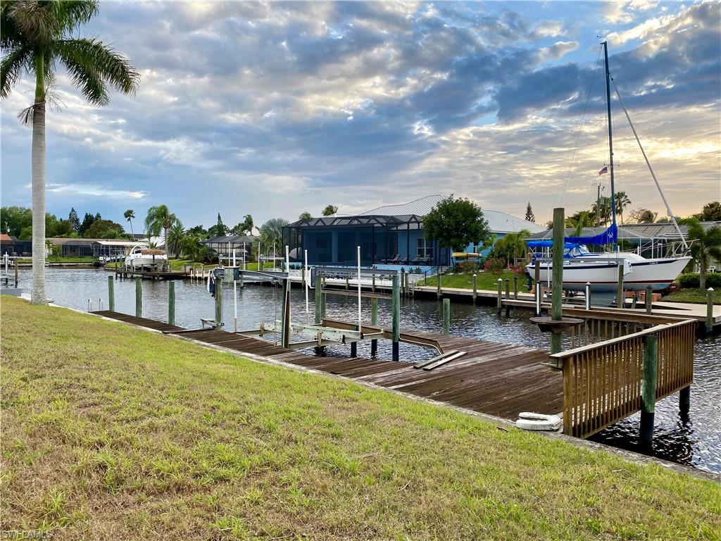 Build your Dream home on this Beautiful , Direct Sailboat access Canal lot ! This slightly oversized lot is located on the 80ft Collier Canal, Just minutes to the River and comes complete with Seawall , Dock , Deck and Boat lift ! Just waiting for you!