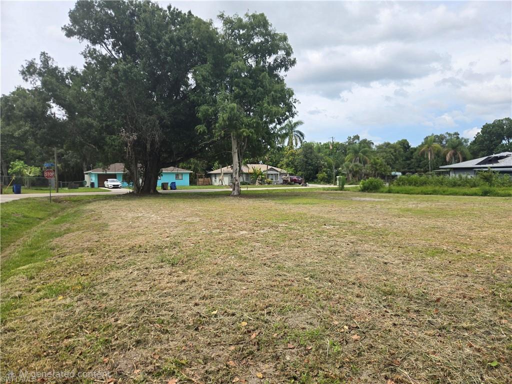 This prime corner lot featuring a large Oak tree is cleared, elevated and ready to build. Approximately 2 feet of fill was brought in on the entire property! That elevation along with the land clearing saves you thousands of dollars! Not to mention the property is walking distance to the public park and minutes from the public boat ramp that leads to the Caloosahatchee River. The area around it is growing exponentially and features many great restaurants, public parks, shopping, hardware stores, etc. It is also a short drive to RSW. Come take a look at the place to build your future home!