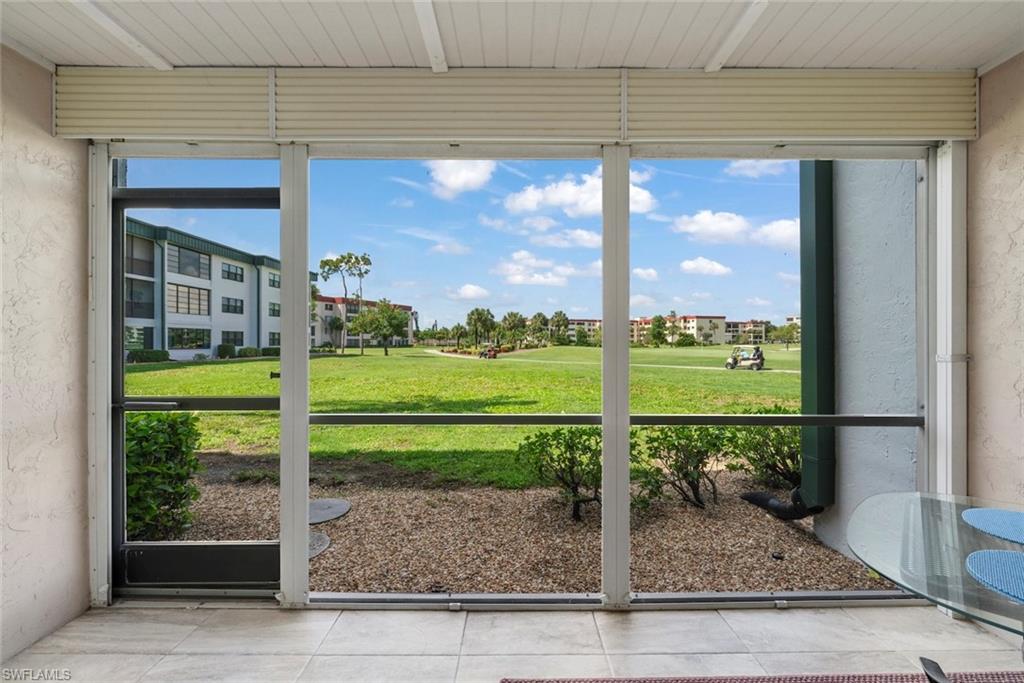 Enjoy panoramic views of the 7th green from this beautifully updated turnkey furnished two bedroom, two bathroom first floor condo in the highly sought after 55+ bundled golf community of Seven Lakes. Offering 922 square feet of comfortable living space, this move in ready residence features a renovated kitchen with granite countertops, white cabinetry, stainless steel appliances, and abundant storage, along with updated bathrooms and luxury vinyl plank flooring throughout. The spacious screened lanai with roll down shutters provides the perfect place to relax and watch golfers pass by while enjoying the peaceful surroundings. Additional conveniences include an in residence washer and dryer and a private exterior storage closet. Seven Lakes offers an exceptional active lifestyle with unlimited bundled golf, tennis, pickle ball, bocce, shuffleboard, multiple swimming pools, a fitness center, clubhouse dining, and a full calendar of social activities. Condo fees include cable, internet, water, sewer, trash removal, and more, making this an outstanding opportunity to enjoy carefree Southwest Florida living just minutes from beaches, shopping, dining, entertainment, and Southwest Florida International Airport.