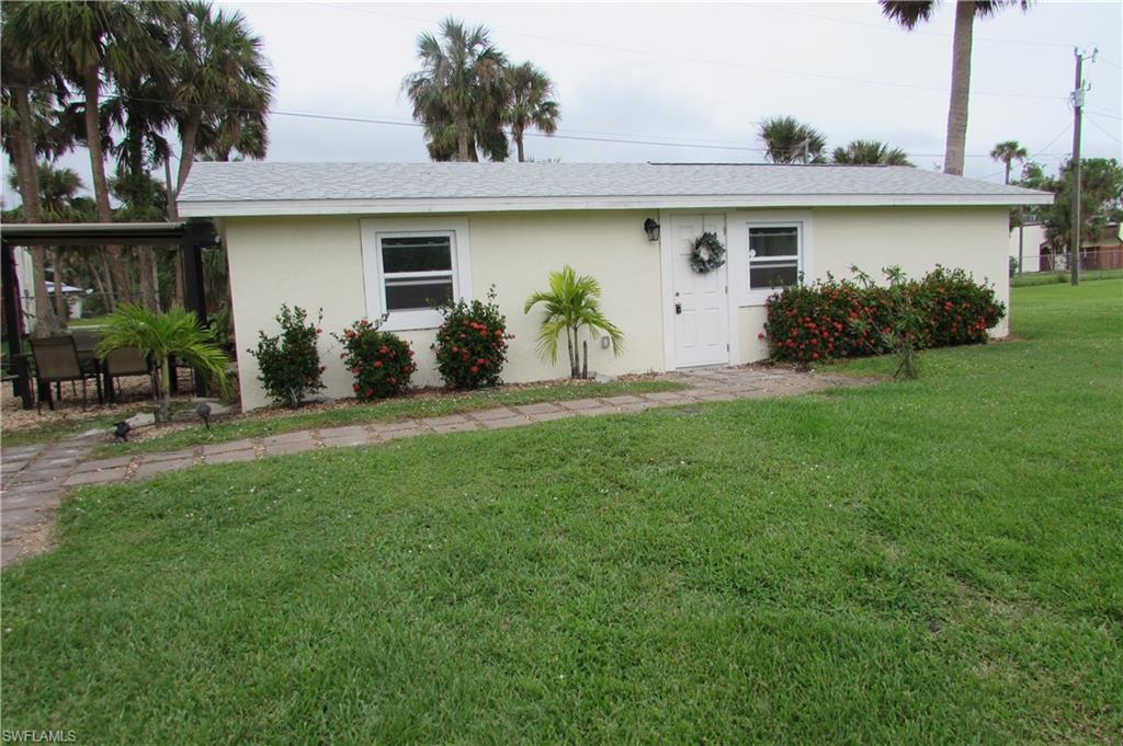 HIGHEST AND BEST DUE BY MONDAY 11/28 at 7PM....with offers to be reviewed on 11/29... REHAB READY! There is a lot of potential with the handyman property. Property just had a renovation in 2020 that  included roof, windows, framing, tile floors, stucco and rest of the service component installations.  The home sustained area flooding damage during Hurricane Ian. As pictures indicate, drywall was removed to the studs up to the ceiling. Renovation should include exterior wall insulation, drywall in interior vertical surfaces, kitchen and bathroom cabinetry, interior doors, rest of the trim and as needed. Any future permitting, repairs, etc. will be the responsibility of the purchaser. Looking for more rehabs? Next door to this property is a 2 building quad-plex for sale that's also been cleared of it's drywall and components at 8030-8042 Cleaves, make it 5 units in one spot! SW Florida is in need of annual rentals after the hurricane, the quicker you can get it ready the quicker it can help the area residents!
