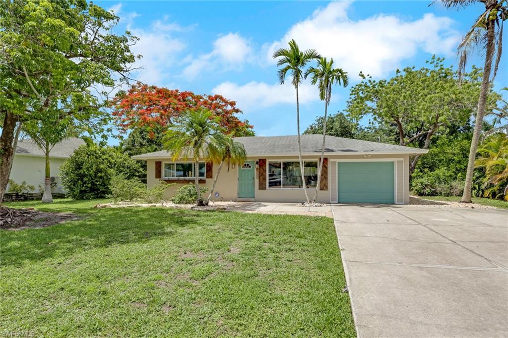 Step into easy Florida living with this bright, updated home designed for comfort and connection. The open floorplan creates a seamless flow between living spaces—perfect for entertaining or everyday life—while the spacious dining area off the kitchen opens directly to the backyard for effortless indoor-outdoor gatherings.
This charming, move-in ready home is ideal for a small family, seasonal use, or full-time living, with a proven rental history delivering strong income potential. The garage adds flexibility—use it for parking or convert it into a home gym or bonus space to fit your lifestyle.  Outside, enjoy an oversized lot with a standout entertainment area, room to add a pool, an outdoor shower, and extra storage. Major updates include a new A/C and a 2016 roof, plus the added benefit of no flooding or storm damage.  Located just minutes from downtown Bonita Springs, you're close to top restaurants, bars, shopping, Gulf beaches, and the airport—making it just as appealing for personal use as it is for renters. Enjoy the true Southwest Florida lifestyle with the ability to bike to downtown or the beach, and easy access to local favorites like farmers markets, festivals, parks, and community events all year long.  A well-located, well-maintained property that delivers on lifestyle and investment potential.