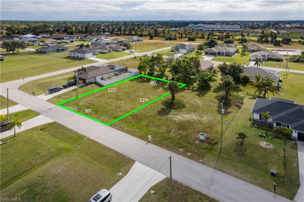 An amazing chance awaits to acquire a 0.23-acre vacant residential lot in the serene NE Cape Coral, providing the perfect canvas for constructing your dream home! This ready-to-build lot offers flexibility for your creative design, allowing you to plan both indoor and outdoor living spaces. Revel in the tranquility of the residential neighborhood while enjoying the convenience of being close to essential amenities. 
Act promptly to secure this valuable property and transform your vision into reality! The lot is conveniently situated near Pine Island Rd, a West-East corridor leading to I41 and I75 (North-South Bounds), providing easy access to other cities such as Venice, Siesta Key, Sarasota to the north, as well as Fort Myers, Naples, Marco Island, and the SWFL International Airport to the south. Don't miss out on this remarkable opportunity to make your homeownership dreams come true!