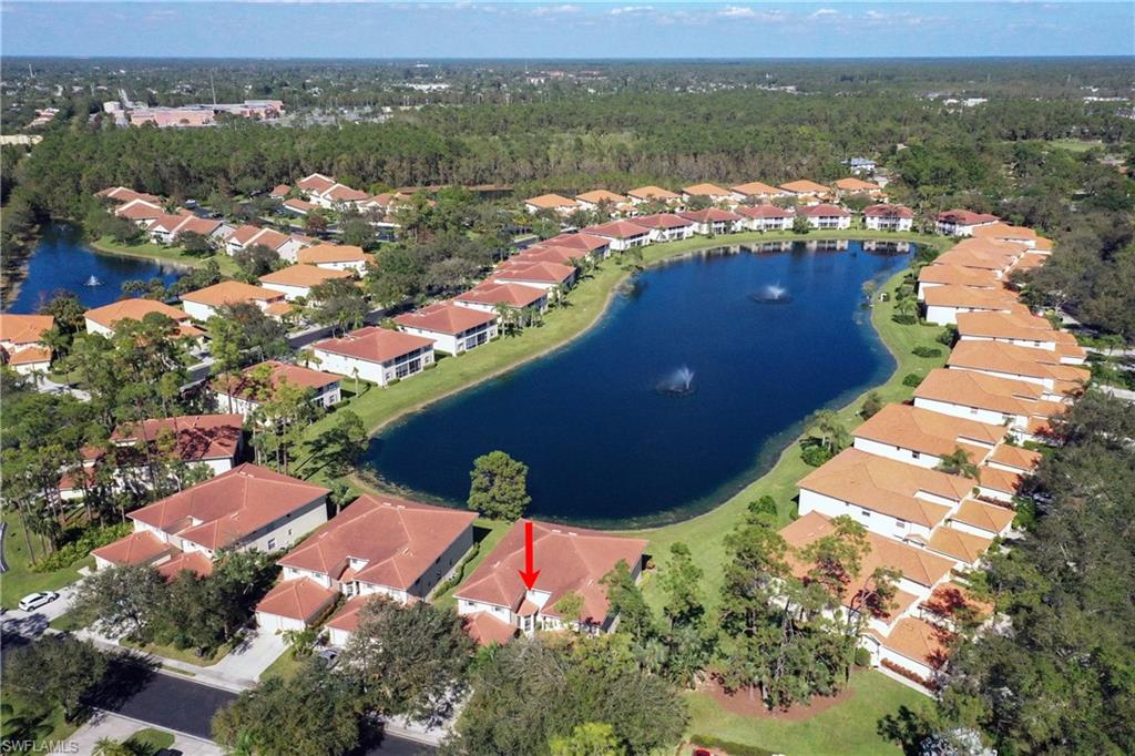 Welcome to Sherwood!  This beautiful 2 bedroom and den attached villa has the best location in the community.  Enjoy the long view of the lake, close to the clubhouse with tennis, pickleball, community pool & clubhouse with fitness room. Sherwood is a quiet and serene area with wonderful wildlife, mature trees and a peaceful setting.  This home has new vinyl flooring, updated guest bathroom, 2 year old a/c & water heater, plantation shutters throughout, nice kitchen countertops, new roof in 2019 and newly painted exterior.  This gorgeous home is waiting your touches!