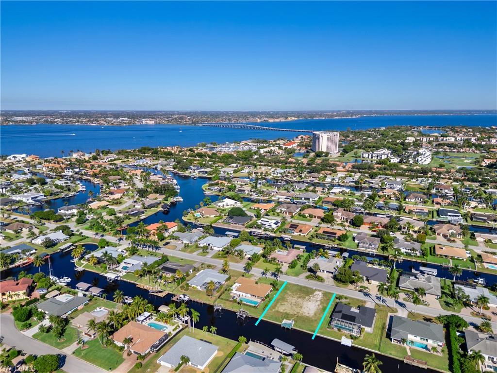 RARE OPPORTUNITY IN TOWN & RIVER! DIRECT GULF ACCESS — NO BRIDGES. Build your dream home on this vacant lot located in one of Southwest Florida’s most coveted deep-water boating communities. With quick, unobstructed access to the river and Gulf of Mexico, this property is ideal for serious boaters and those seeking a luxury waterfront lifestyle. Situated on an established street surrounded by high-end homes, the lot offers canal views, excellent water depth, and a premier location close to Sanibel, Captiva, and Fort Myers Beach. Town & River is known for its private, upscale feel, beautifully maintained properties, and some of the best boating in all of Fort Myers. Create a custom waterfront residence with room for a pool, outdoor kitchen, and the dock of your dreams. Close to top dining, shopping, airport, marinas, hospitals, and A+ conveniences. Direct access. Exceptional neighborhood. Endless potential. Lots like this rarely become available—don’t miss your chance.
