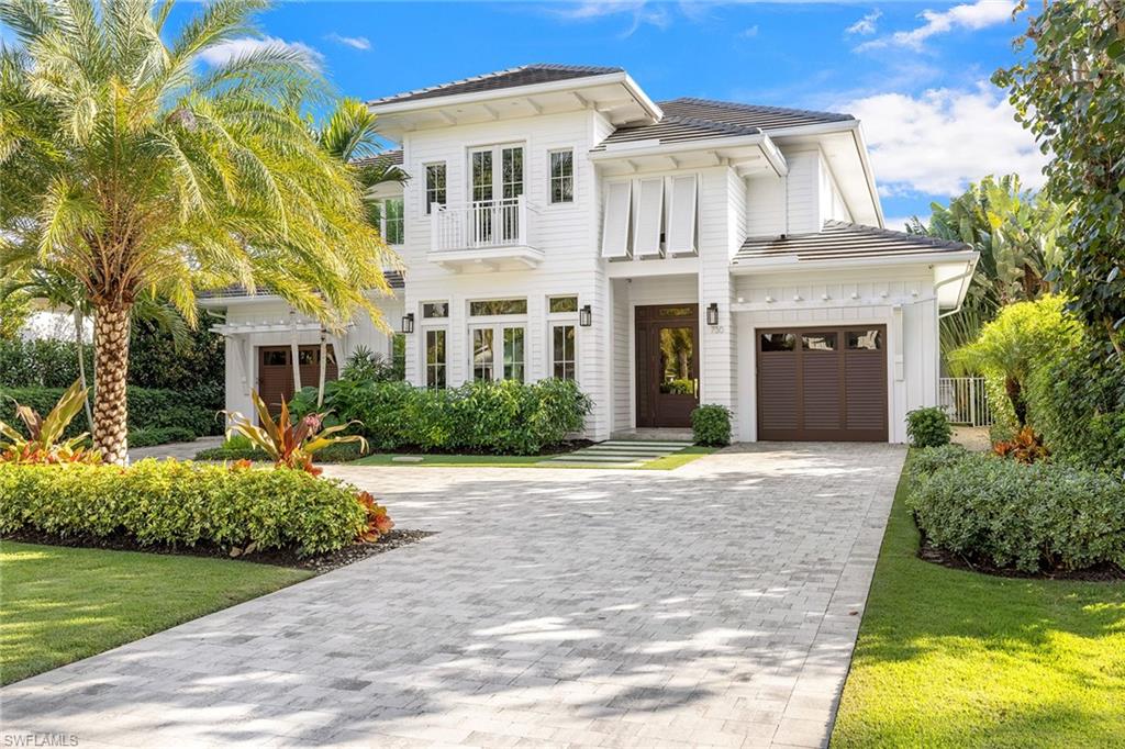Available for immediate occupancy. This property is in an X-Zone and came through the hurricane beautifully.
Spacious, 5,121-square-foot newer construction five-bedroom, five full and two-half bath home features wide-plank hardwood flooring, shiplap walls, elevator, a glassed wine room with climate-controlled chilling system, a chef’s kitchen with Miele appliances, quartz countertops, large island, custom cabinets, tankless water heaters, den and separate casita. This home is beautifully designed and finished with an easy flow to an exceptional outdoor area, offering a nice selection of grassy yard or covered and uncovered areas for gathering by the fire pit or dining alfresco near the summer kitchen. The pool and spa are enhanced by the glow of dual fire bowls. Ideally located close to charming restaurants and shops of Fifth Avenue and the sugar sand beaches along the Gulf, this home offers the best of Old Naples, Florida.