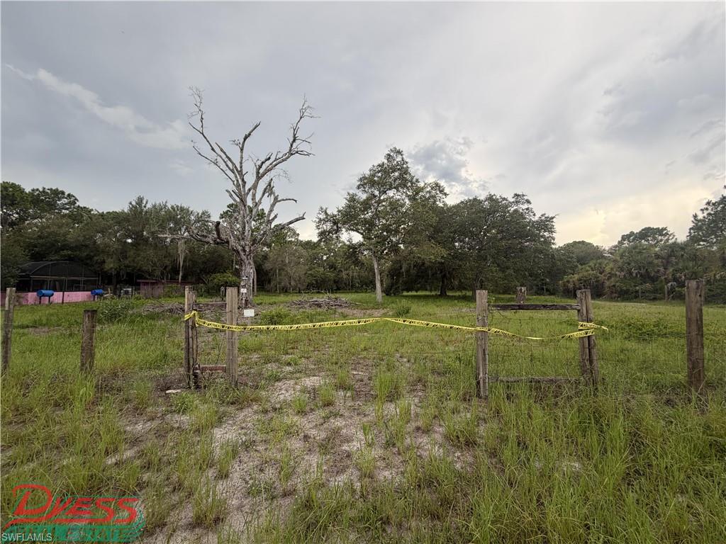 1.25 acres for sale on the south side of Montura Ranches of Perimeter Rd. Parcel has been cleared and fenced in. Manufactured, Modular and Site-Built Homes allowed. Will need septic, culvert and well. Electric close by. Montura Ranches is a rural golf-cart friendly and horse friendly community that allows for animals and has plenty of space for your toys. This is a growing rural community with convenience stores and a medical center. 30 min from downtown Clewiston, 1.5 hr from each coast. Enjoy Florida weather year-round and the space to plant, have animals or have your atvs, rvs with main dwelling on site.