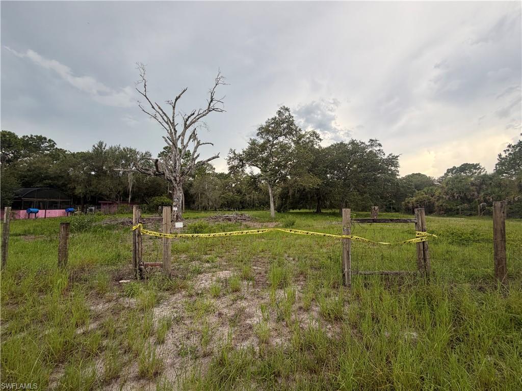 1.25 acres for sale on the south side of Montura Ranches of Perimeter Rd. Parcel has been cleared and fenced in. Manufactured, Modular and Site-Built Homes allowed. Will need septic, culvert and well. Electric close by. Montura Ranches is a rural golf-cart friendly and horse friendly community that allows for animals and has plenty of space for your toys. This is a growing rural community with convenience stores and a medical center. 30 min from downtown Clewiston, 1.5 hr from each coast. Enjoy Florida weather year-round and the space to plant, have animals or have your atvs, rvs with main dwelling on site.