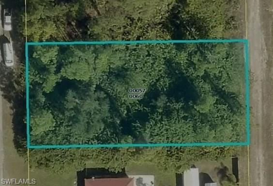 Oversized 0.31-acre residential lot located in the peaceful community of Alva/Lehigh Acres. The property is partially cleared, offering a great head start for future development. Situated in a quiet residential area with easy access to main roads, schools, and local amenities. Ideal for building your dream home or holding as an investment in a growing area of SWFL.