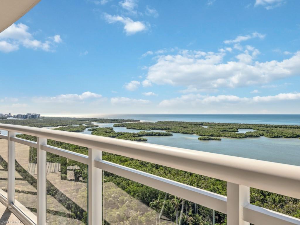 Perched high above the shimmering Gulf on the 20th floor of Kalea Bay’s prestigious Tower 400, this sprawling four-bedroom, four-and-a-half-bath sky home exudes coastal luxury at its finest. Awash in natural light from floor-to-ceiling sliding glass doors, every corner frames mesmerizing, panoramic views. The residence’s crown jewel is its unparalleled lanai space, one of the largest in the tower, seamlessly blending indoor and outdoor living. Professionally designed,  every detail reflects sophistication and comfort, with an open-concept floor plan, a gourmet kitchen with Subzero® & Wolf® appliances, spa-like bathroom, and luxurious finishes throughout. Refined finishes, modern appointments, and a thoughtfully flowing layout indulge comfort and sophistication. Coupled with Kalea Bay’s world-class amenities—resort-style pools, chic rooftop lounge, and state-of-the-art fitness center—this exceptional residence is a rare offering of both grandeur and grace.