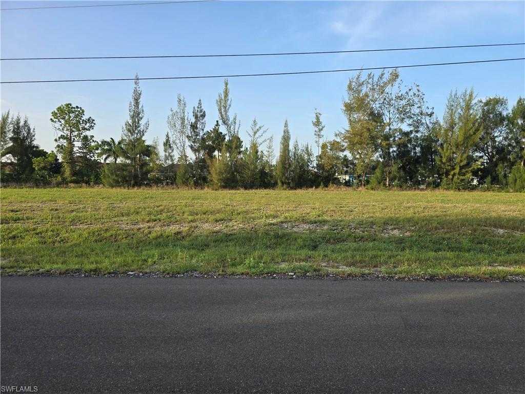 OVER-SIZED --Waterfront – CANAL LOT.  Over a 1/3 of an acre.  Build your Deam Home on this Oversized Residential lot located on a Fresh Water Canal in Cape Coral Florida where you can fish, Kayak or paddleboard in your own backyard.  This property is within walking distance from the 16 Acre Gator Trails Park that features walking paths, playground, picnic area, pickle ball and basketball courts. Come live the Florida lifestyle with a short drive to downtown Fort Myers and downtown Cape Coral for dining, entertainment, music and art walk events every month Or a short drive to our white sandy beaches of Fort Myers and Sanibel Beach. Located near shopping, schools, hospital and 2 airports.  This prime oversized Canal lot want last long. NOT located in a Special Flood Hazard Area (IN Flood Zone X) where most lenders will not require flood insurance