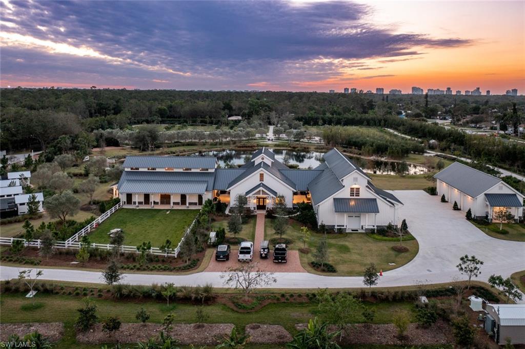 This organic farm is nothing short of a five-star equestrian center! No stone was left unturned by its present owner when it came to transforming this farm into a thing of function, accessibility, comfort, & beauty. Enter the paved, gated, entrance to the land of enhancement. As you make your way to the professionally designed main lodge, you will you pass the exquisitely landscaped grounds surrounded by citrus trees, fruit & vegetable gardens, free range organic chicken coups, 60-year-old olive trees, palms from around the world & a magnificent butterfly garden. Upon entering the grand lodge, you walk into soaring ceilings, a well-designed kitchen, living area and one bedroom. From there you have direct covered access to the stables and paddocks. This state-of-the-art facility includes six 12 x 12 stalls, together with every amenity you would expect. Lastly, for the car lover there are two oversized car garages that can hold up to 22 cars comfortably with room to expand. This farm is so much more than words can describe, but rest assured, it will leave you speechless.