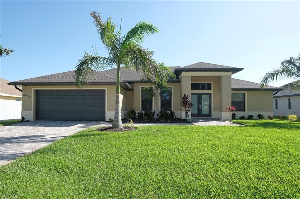 Perfectly Located South West Cape Coral Home with Pool. This home has many upgrades such as Impact doors and windows , granite counter tops ,custom wood cabinetry , tile through high end plumbing and electrical trim finishes. Private Back yard with hedge landscaping , crown molding / tray ceilings , rope lighting and much more. Home  was built just over a year ago still like new. A must see!