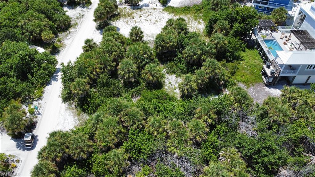 FANTASTIC Residential Lot for Sale on North Captiva Island! Desirable High and Dry Area of the Island. Lush and Tropical...A Simply Wonderful Lot for your New Beach House Build! Easy to Clear. Close to Butterfly Beach and a Short Distance to all of the Island Beaches and the Island Amenities. Partially Cleared with the Potential of Partial Gulf and Bay Views! Come and Explore all that North Captiva Island has to Offer! Daily Ferry Services are available. Visit our Gorgeous Beaches with Amazing Fishing and Shelling. Drive a Golf Cart, Rent a Fat Tire Bike, or Walk the State Preserve, while Admiring the Birds, Tortoises, Eagles, Manatees, Dolphins, and other Wild and Marine Life! Island Amenities include Boats and Fun Store, Mangos Convenience Store and Outdoor Grill and Bar, Barnacles Outdoor Bar, Mainstay - Indoor and Outdoor Restaurant, Mainstays Ice Cream and Gift Shop. and Over the Waterfront Restaurant! A Great Opportunity Awaits You! Please inquire today!