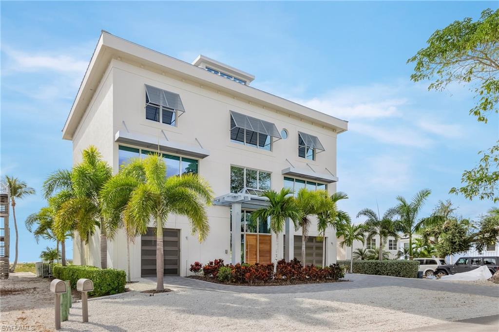 Exquisite Beachfront Home.  This home has been featured in the Naples Edition of Florida Design Magazine.  European flair is present in this well crafted home of concrete construction.  Elegant, streamlined, functional and comfortable home on the south end of Fort Myers Beach overlooking the Gulf of Mexico.   Contemporary coastal style with Italian & Scandinavian furniture.  Award winning kitchen with Subzero & Wolf appliances.  There is a special beauty about this home with niceties too numerous to mention.  Large lanai area with pool, spa and ample room for entertaining.  The location of this home is perfect as it is beachfront yet set back just enough that the beach walkers will not know what's for lunch.  Beachfront yet not on the noisy main road.  This is your rare opportunity to own this luxury direct beachfront home on Ft Myers Beach.