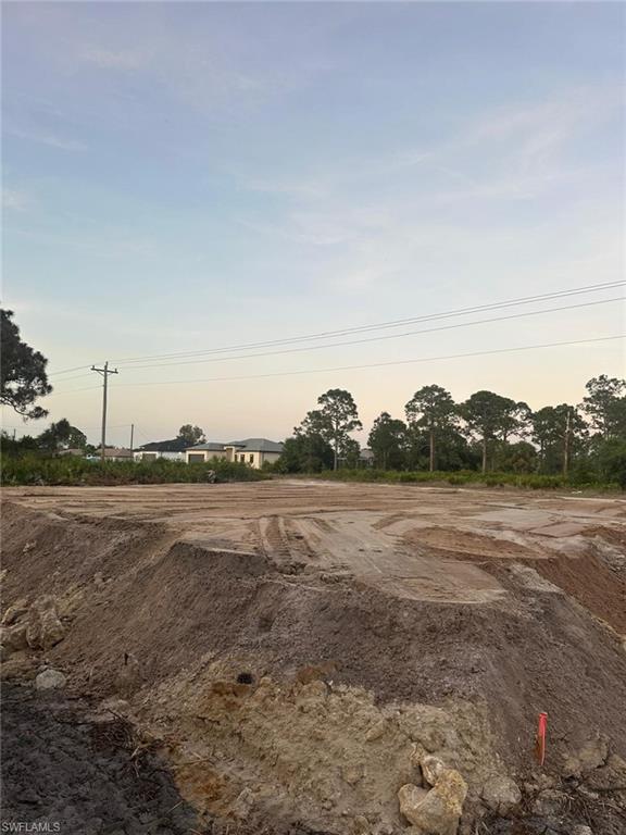 Partially started home construction on a desirable corner lot with permit. The property currently has the pad completed and includes approved building plans, active construction permit RES2025-04139, and paid impact fees — saving approximately 4 months of waiting time.

The first payment for trusses has already been made, adding further value to the project.

Conveniently located just a short distance from SR 82, on the first street entering Lehigh Acres when coming from Miami, offering excellent accessibility.

A great opportunity for builders or buyers looking to fast-track their construction timeline.