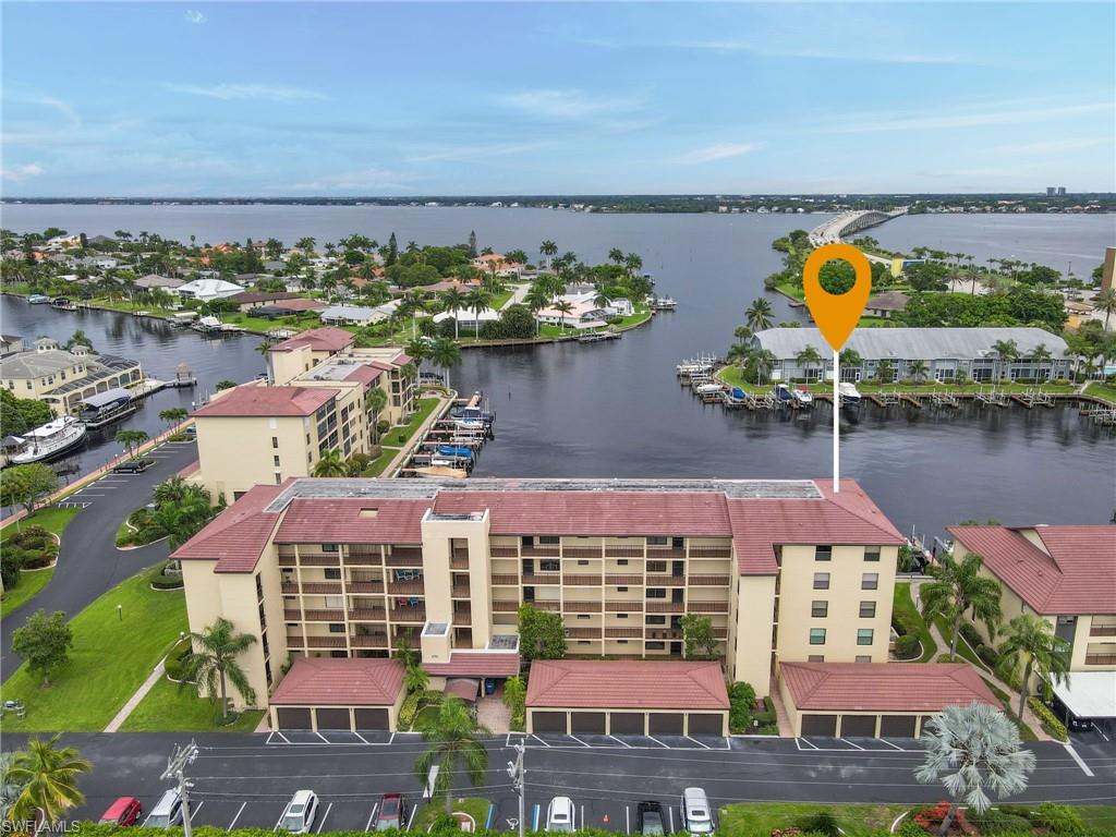 Turnkey main floor condo, with deeded dock and Detached garage, 3 bedrooms, 2 full baths, 3rd bedroom acts as Den with Murphy bed, wet bar off living room, larger corner lanai, recent newer hurricane shutters on lanai, fast access and no bridges. It is about location with stunning southern views overlooking the boat basin at Clipper Bay. This home has direct boat access and is just minutes to the Caloosahatchee River, the Gulf of Mexico, and the sandy white beaches of Fort Myers Beach & Sanibel Island. Additionally, this unit comes with a larger lanai with newer hurricane proof sliders and extra locked storage room. Clipper Bay offers beautifully manicured grounds, clubhouse with pool & spa, tennis courts, and Fishing Pier. This home is within walking distance to Ford Garage, bars and restaurants, are very abundant near this location by foot ot by boat.