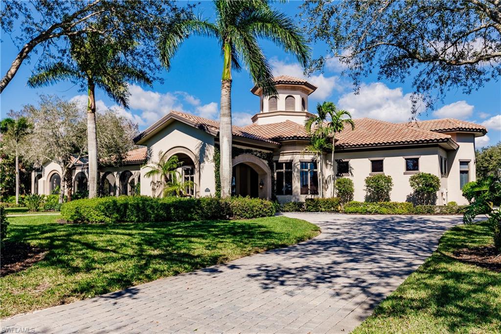 EXCEPTIONAL VALUE - $500,000 PRICE REDUCTION! This magnificent Estate Home comes with a Full Golf Membership offering luxury living at an unmatched value. This residence is absolutely stunning! With its expansive lot, picturesque lake and golf course views, and meticulous landscaping, it's a true oasis. The attention to detail in its architectural design and craftsmanship is evident throughout its 5,071 sq ft of living space. The inclusion of 4 bedrooms, 2 offices, 5 baths, and a spacious 4-car garage ensures both luxury and practicality. The rotunda entryway sets a grand tone, leading seamlessly to an outdoor courtyard and connecting to the open great room, kitchen, and dining area, perfect for both everyday living and special occasions. And with a total of 8,532 sq ft that includes an impressive colonnade structure, oversized pool and spa, fireplace, full outdoor kitchen, and multiple seating areas, it's designed for ultimate relaxation and entertaining. The addition of a private guest bedroom suite with a wet bar, bath, and sitting area adds an extra layer of luxury and convenience for guests. And with features like stone flooring, custom woodwork, tray ceilings, a lighting system, and security cameras, every detail has been carefully considered to create a truly exceptional living experience. Located in the TwinEagles private golf community, which has recently undergone a significant $30,000,000 renovation, including a new clubhouse, bocce facilities, and upgrades to the golf course, this residence offers not just a beautiful home but also access to a vibrant and upscale community lifestyle in Southwest Florida.