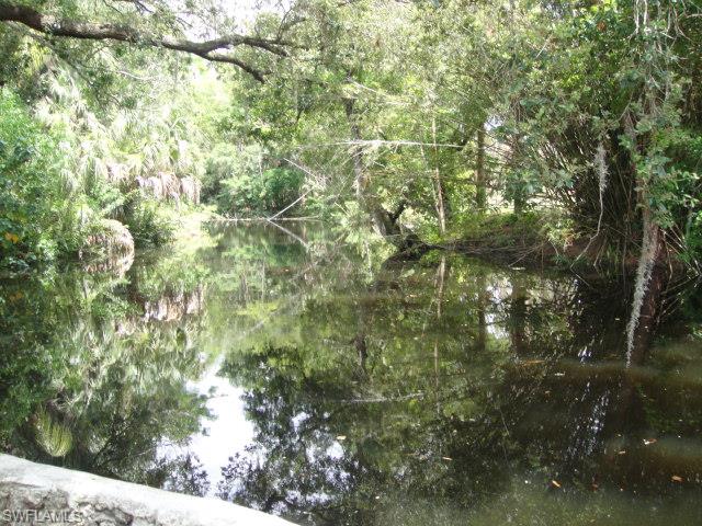 Looking for a one of a kind, old Florida style property with loads of charm? Your search is over! Boasting a southern rear exposure, on beautiful Oak Creek, just 10 min from the Imperial River. Launch a kayak or canoe from the 120ft custom concrete seawall right in your backyard. A landscapers’ paradise with hundreds of plants, trees, and shrubs throughout the oversized lot. Brand new irrigation system recently installed. 2 complete, separate homes on the property, both totally re-built from the ground up. All exterior walls are pressure treated wood. All electric removed and re-wired including breaker boxes. All plumbing also removed and re-piped. All exterior siding, doors, drywall, wood trim, flooring, etc. is new. All new insulation including interior walls and insulated tinted windows = two energy efficient and quiet homes. 20x20 porcelain tile in main home. New concrete walkway and custom-built wood deck for relaxing behind the 420sq ft workshop. Main home has 1190sq ft of living space, cottage has 625sq ft with a combined total of over 1800sq ft between the two, offering great value per square foot. Cottage is currently rented for $1,000/mo.