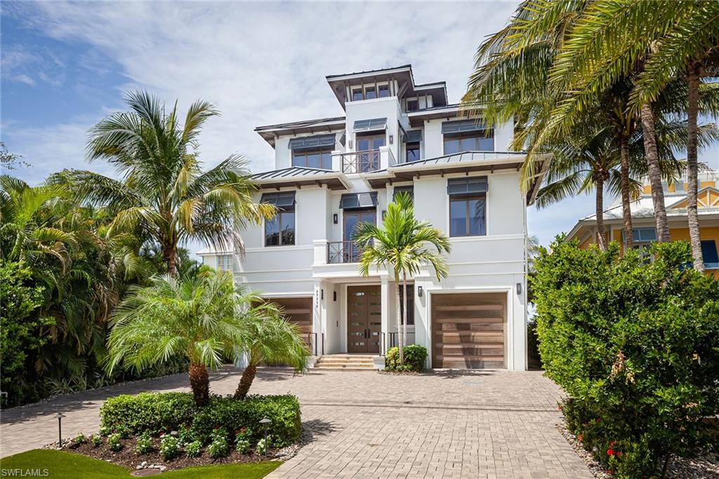 Direct toes-in-the-sand beachfront home. This is the only house on the island with a double-entry circle drive and absolutely no homes across the street. Gorgeous coastal-contemporary home featuring an open floor plan, pocketing sliders leading to the lanai, an infinity-edge pool and spa, outdoor kitchen and secured, non-spiral staircase to the sparkling waters of the Gulf of Mexico. The rear yard is very private with beautiful, natural landscaping and teak pathway to the beach. Chef's kitchen boasts Thermador appliances with a gas cooktop, leathered granite countertops and a full wet bar with a beautiful stone wine cellar adjacent to the great room. Smart home technology, both Crestron and Control4, includes surround sound, a smart lighting system, motorized shutters/screens, motorized window treatments, an electronic door locking system and a private elevator. Furnished and professionally designed by the award-winning design team of Collins DuPont. Built to the newest and most stringent codes by Potter Homes, Inc. with concrete block construction and all impact-rated doors and windows. The garage accommodates six automobiles.