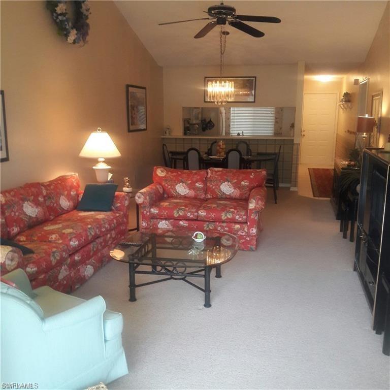 Very nice second floor unit with plenty of natural light and beautiful pond views. Don't miss the chance to preview this Woodmere lake unit. Relax and take in the peaceful environment from the screened lanai overlooking the water. This 2BR/2BA condo is being offered turnkey, and is move-in ready for a new owner. Woodmere Lake Club offers a tranquil setting where owners enjoy a community pool, BBQ areas and tennis - all while benefiting from the low fees that make Woodmere such a great value. Just a short drive to all that Naples has to offer!