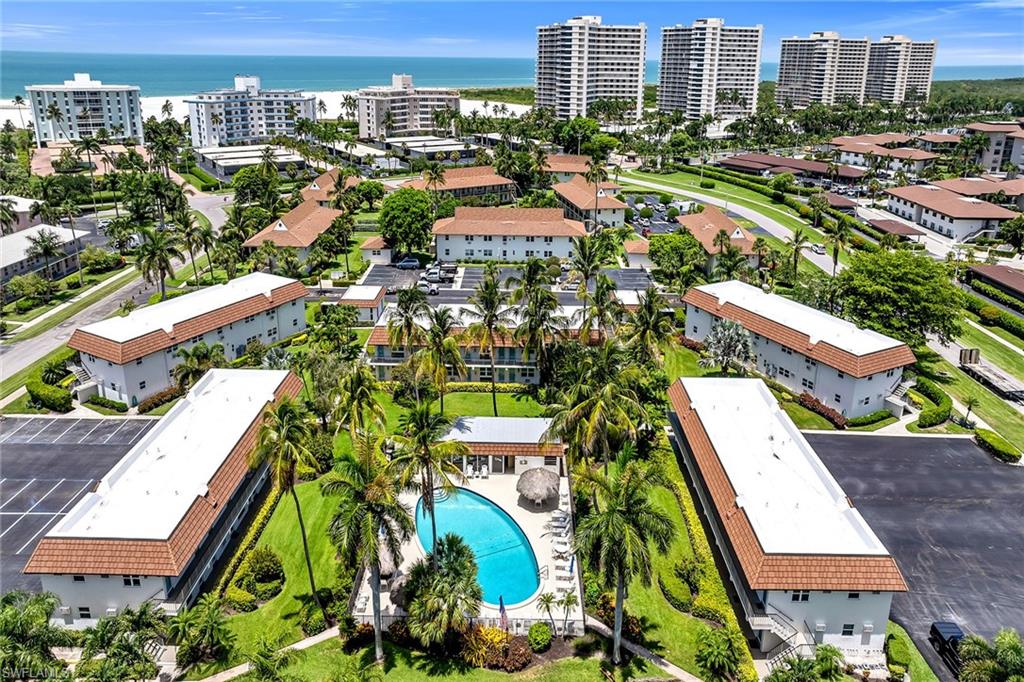 Enjoy the simplicity of island living in this beautifully furnished efficiency conversion to one bedroom residence offering desirable southern exposure in the charming Seabreeze community on Marco Island. Thoughtfully designed to maximize comfort and functionality, this inviting condominium presents an exceptional opportunity for a vacation retreat, seasonal escape or low-maintenance full-time residence in one of Southwest Florida’s most sought-after destinations. Filled with natural light from its sunny southern exposure, the welcoming interior creates a bright and airy atmosphere that enhances the home's comfortable layout. The thoughtfully designed kitchen features built-in cabinetry and stainless steel appliances, including a range, French-door refrigerator and microwave, providing both style and convenience for everyday living. A breakfast bar with seating for two offers the perfect space for casual dining, morning coffee or planning the day's island adventures. Offered furnished, this move-in-ready residence allows you to begin enjoying the Marco Island lifestyle immediately or take advantage of its excellent potential as an investment property or seasonal getaway. The full bathroom is efficiently designed to complement the home's practical layout while maintaining comfort and functionality. Residents enjoy effortless access to the beautifully maintained community grounds and a variety of amenities designed to enhance everyday living. Just a short stroll away, the community pool provides the ideal setting for soaking up the Florida sunshine, while the barbecue and picnic area offers a wonderful space for gathering with family and friends. Additional conveniences include a community room and common laundry facilities, creating a carefree and enjoyable ownership experience. Ideally positioned close to Marco Island's world-renowned white sand beaches, waterfront dining destinations, boutique shopping and popular local attractions, this residence places the best of island living right at your fingertips. Whether spent enjoying spectacular sunsets along the Gulf, exploring nearby parks and waterways, or simply relaxing poolside with a book, every day feels like a vacation. Perfect as a personal getaway, seasonal residence or investment rental opportunity, this charming furnished condominium offers exceptional value and lower efficiency maintenance fees while providing a bedroom along with the opportunity to enjoy the relaxed coastal lifestyle that makes Marco Island one of Florida's premier destinations.