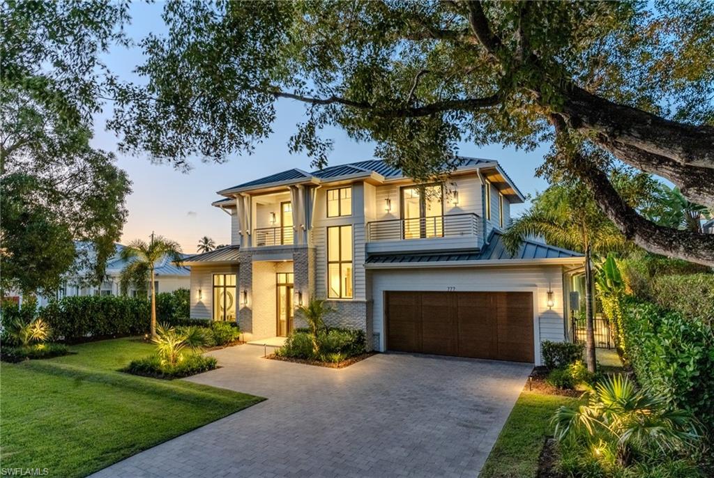 Exceptional new construction single-family home in Old Naples. 5,000 square feet of open-floor-plan living space. 5 bedrooms and 6 bathrooms. Walk or bike to the new Four Seasons Resort and restaurants. Sophisticated finishes throughout the home. Floor-to-ceiling windows and sliding doors at the great room open out to a covered patio, outdoor kitchen, and backyard lawn with a pool, spa, and fire table for effortless indoor/outdoor living. The ground floor includes an oversized master suite & sitting room with a spacious, sun-filled bathroom and two enormous walk-in closets. A guest bedroom with an en-suite bath is also located on the 1st floor. The kitchen is equipped with custom cabinetry, Wolf/Subzero appliances, two dishwashers and an island with seating for five. A walk-in pantry includes a wine cooler, pull-out refrigeration drawers, and open shelving. The 2nd floor has 3 additional large bedrooms with en-suite bathrooms and walk-in closets. All of the 2nd floor bedrooms open out to balconies for fresh air breezes and a seamless transition to an outdoor living experience. A large 2nd floor loft area also opens out to a sunning balcony overlooking the pool for a relaxing environment. The home has two laundry rooms, one up, one down, for ease of daily living. The 2nd floor also includes a morning bar with a sink and refrigeration drawers. A Control4 smart-home lighting system with audio/video is installed throughout the home along with a multiple camera security system. All systems can be run via a smartphone or iPad. Motorized roll-down screens and hurricane shutters at the outdoor patio. Anderson Windows and sliding doors are prewired for automated shades. Toto #700 series electronic toilets in all bathrooms. A 48kW Generac generator powered by natural gas is housed on a roof pad to run the entire home in the event of a power outage. Natural gas also fuels the Wolf six-burner range, an outdoor built-in grill, two fireplaces, tankless water heater, heated saltwater pool & spa, and an outdoor fire table. Three air-conditioning zones for maximum comfort control with linear vents for a sleek aesthetic appearance and optimal air distribution. Flood insurance is not required for this property (located in an X zone with a slab at over 11’ NAVD). For a quiet, serene outdoor environment, the home is not located in the Naples Airport landing and take-off flight paths. Designed by MHK Architecture, built by Lotus Construction, with interiors by Freestyle Interiors.