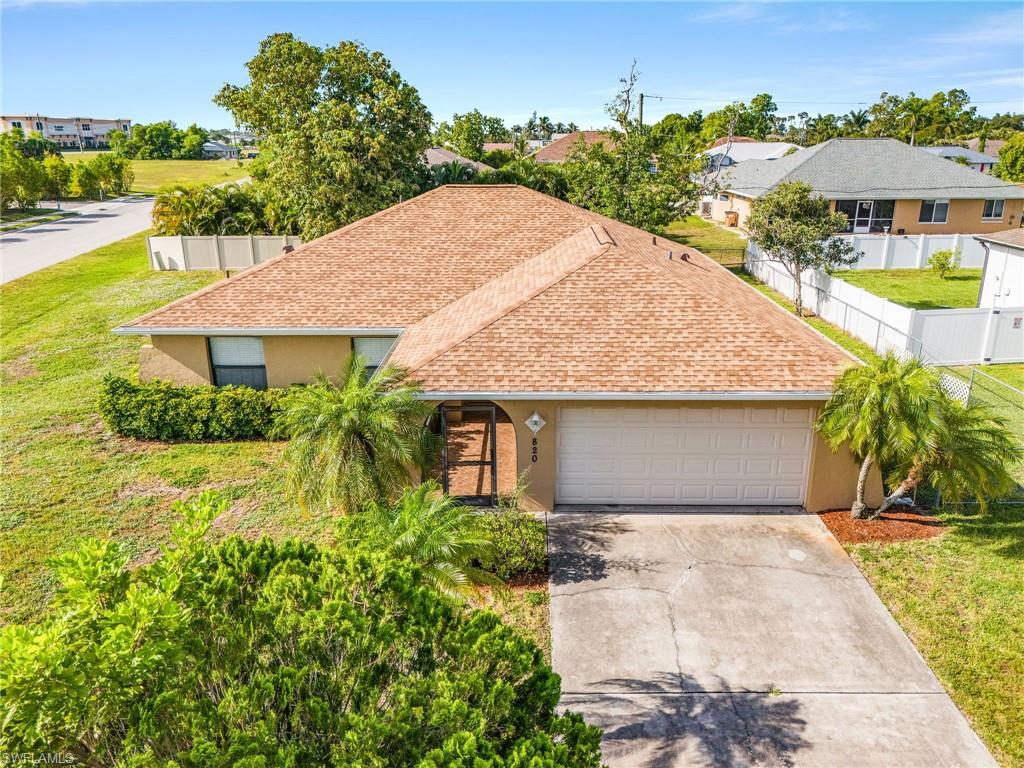 HIGHEST AND BEST OFFER BY 10:00AM JULY 4TH, 2026
Discover your dream home in vibrant Cape Coral, where a serene lifestyle meets convenience and charm! This inviting property boasts a fully fenced yard complete with a mature mango tree, large screened lanai, perfect for outdoor relaxation or a weekend barbecue. The home includes a spacious 2-car garage and features tile floors throughout, enhancing its modern appeal. Recently updated with a 2022 shingle roof, it's ready for your personal touches to make it uniquely yours. Perfectly located, you're just minutes away from shopping, dining, and the convenient access of Veterans Pkwy, which makes a short trip to Fort Myers and the stunning coastal beaches a breeze. Embrace the opportunity to make this beautiful house your new home! Great for the first time home buyer, investment, you name it!!