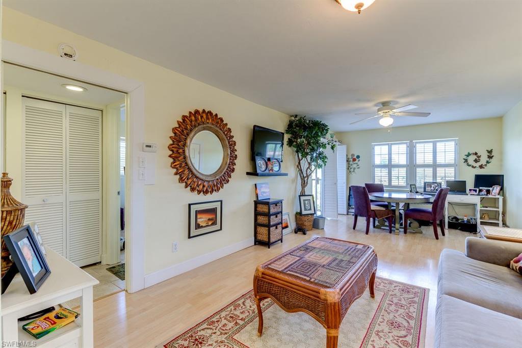 This one is adorable!! This light and bright 2nd floor unit puts your view at the top of the Palm Trees and says Paradise from the minute you walk in. Tile and Wood flooring, Washer and Dryer in the unit. The grounds are well manicured and the pool & tennis courts are steps away. Make this your perfect vacation getaway or use as a seasonal rental for income. Low maintenance fees- great location- minutes to Sanibel Island or Fort Myers Beach. Walking distance to the Outlet Mall. Come check this one out you will not be disappointed