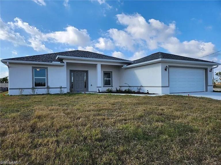 This beautiful home has 4 bedrooms, 3 bathrooms and a 2 car garage plus vaulted ceilings, quartz countertops, stainless steel appliances, a large kitchen island, inside laundry room, and has tile throughout. Large screened in lanai and back yard. Great location in NW Cape Coral. Tenant occupied. Please request a showing at least 24 hours in advance.